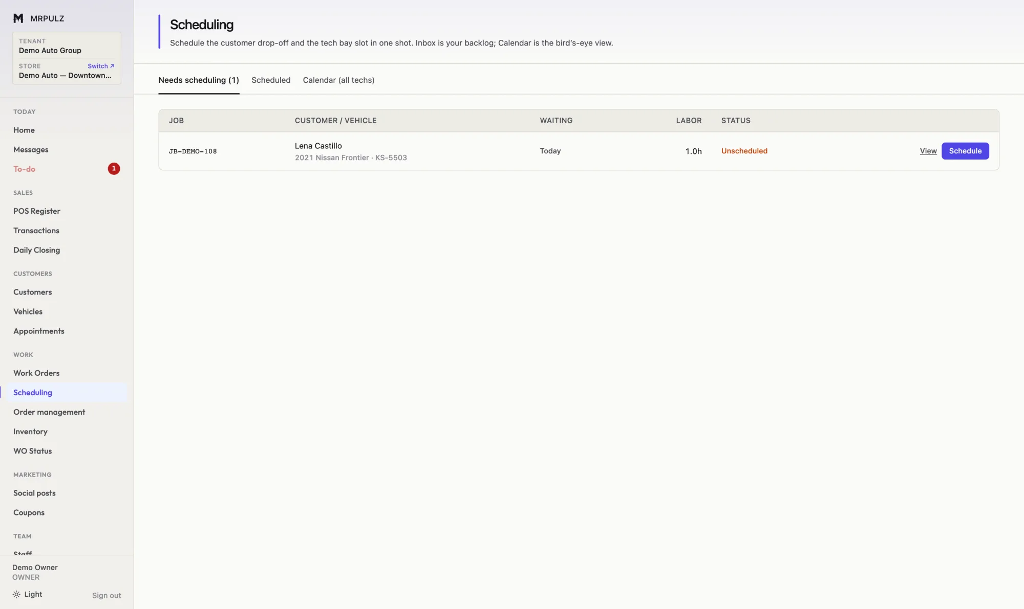 Scheduling screen with an inbox of jobs waiting to be scheduled alongside a calendar of technician bay slots